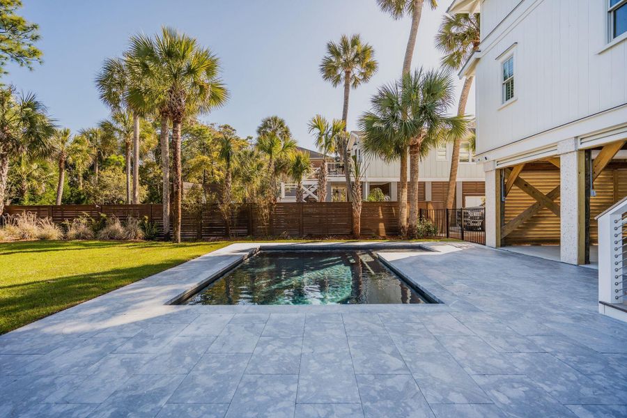 Exterior details and patio area of a home in , Folly Beach (Image 53).