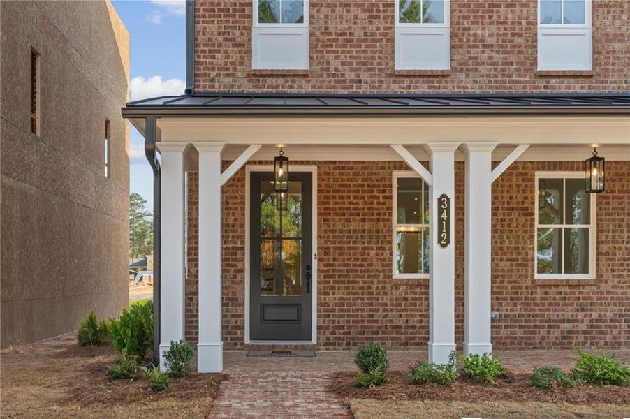 Exterior details and patio area of a home in Archerfield, Smyrna (Image 25).