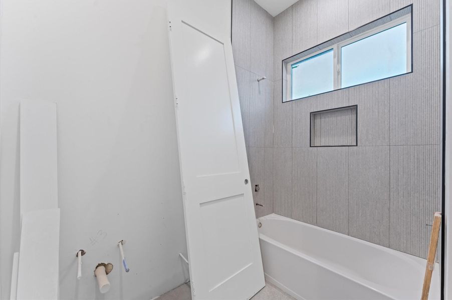 Full bathroom on the second floor, accessible from a bedroom. Full bathroom on the second floor, accessible from a bedroom.