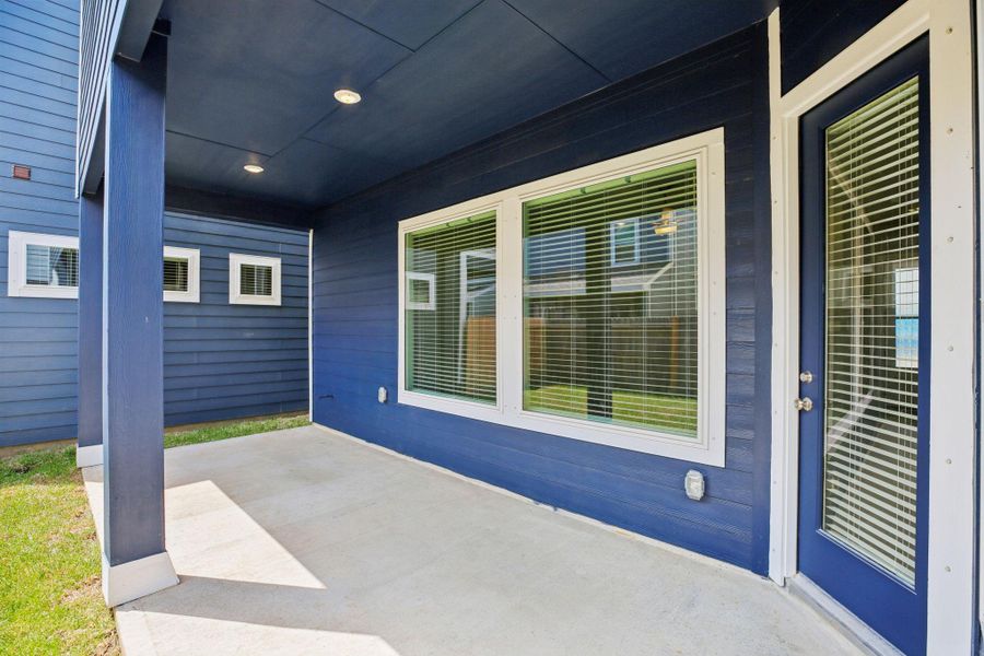 Front exterior of a new home in Kemah Crossing - Luxe Series, Kemah, TX, highlighting curb appeal (Image 27). Front exterior of a new home in Kemah Crossing - Luxe Series, Kemah, TX, highlighting curb appeal (Image 27).