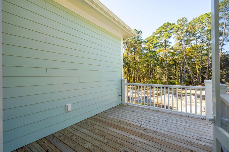 Exterior details and patio area of a home in , Johns Island (Image 31).
