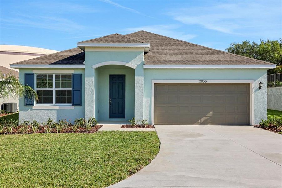 Front exterior of a new home in Willowbrook North, Winter Haven, FL, highlighting curb appeal (Image 1).