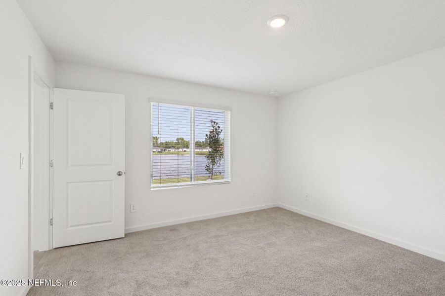 Spacious, unfurnished interior of a new home in Lakes at Bella Lago - Signature Series, Green Cove Springs (Image 12). Spacious, unfurnished interior of a new home in Lakes at Bella Lago - Signature Series, Green Cove Springs (Image 12).