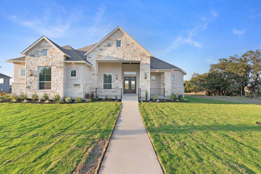 Front exterior of a new home in Feathergrass, Florence, TX, highlighting curb appeal (Image 34).