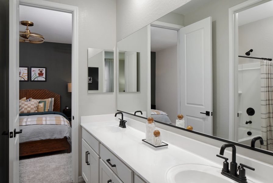 Bath 2 - model home. Finishes and options may vary by community