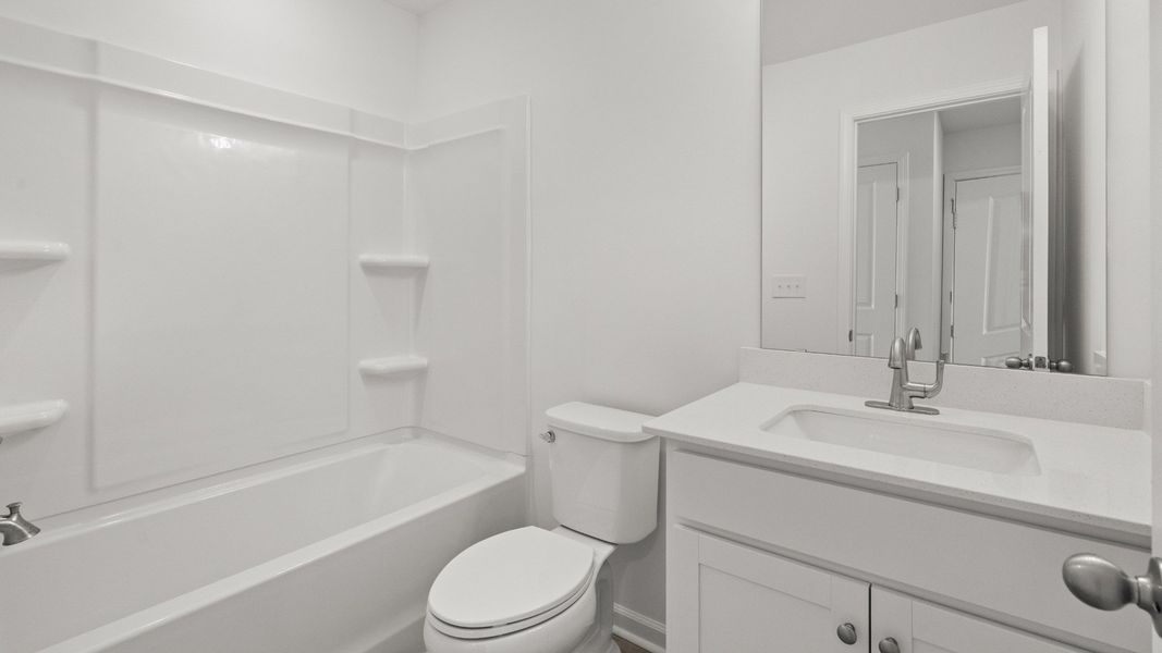 Furnished interior view inside a new home in Seabreeze Crossing, Little River (Image 15).