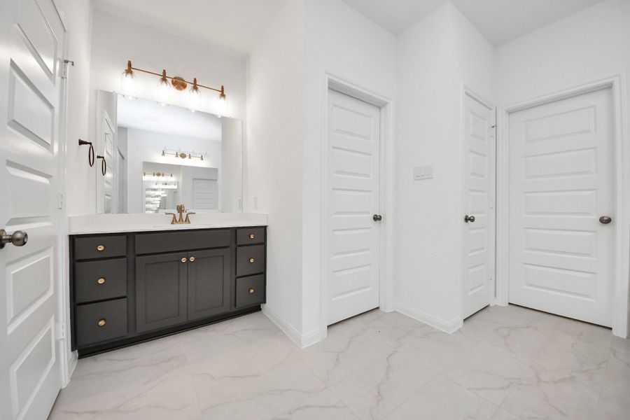 Furnished interior view inside a new home in Elyson, Katy (Image 10).