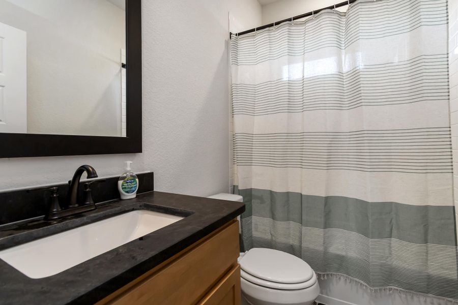 7011 Alamo Estates - Model - Lubbock - Secondary Bathroom 7011 Alamo Estates - Model - Lubbock - Secondary Bathroom