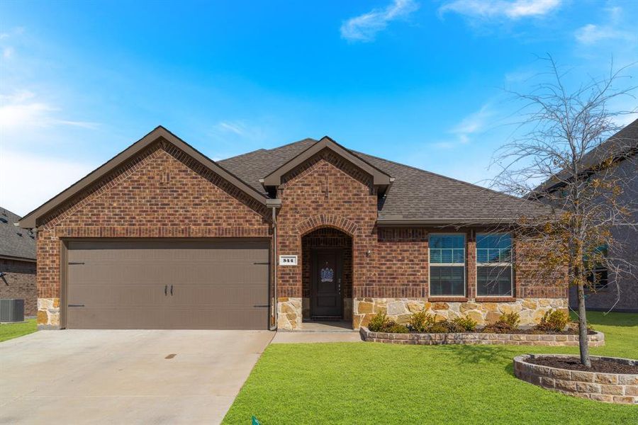 Rockwall ISD and decorative stone on facade as well as landscaping!