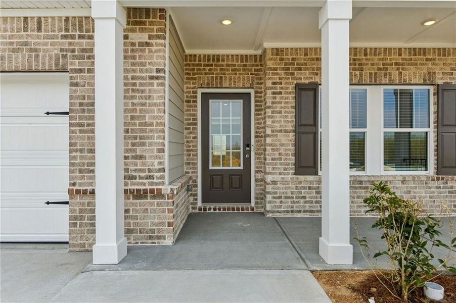 Exterior details and patio area of a home in Preserve at Mountain Creek, Pendergrass (Image 24).