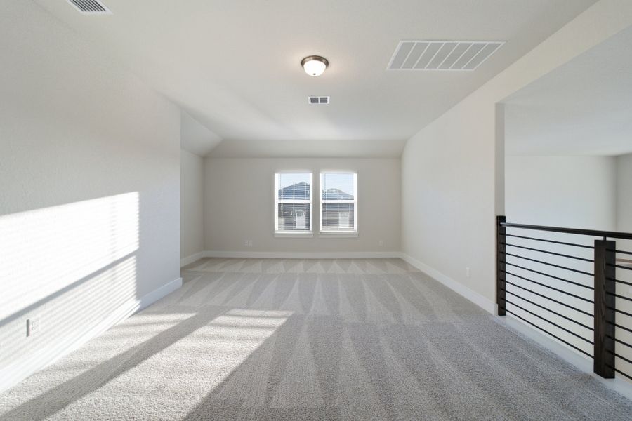 Spacious, unfurnished interior of a new home in The Woodlands at Medina Hills, Mico (Image 35).