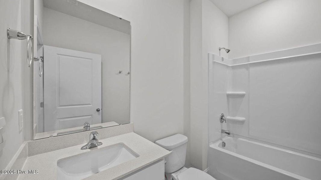 Furnished interior view inside a new home in Villa Grande, Winterville (Image 5).