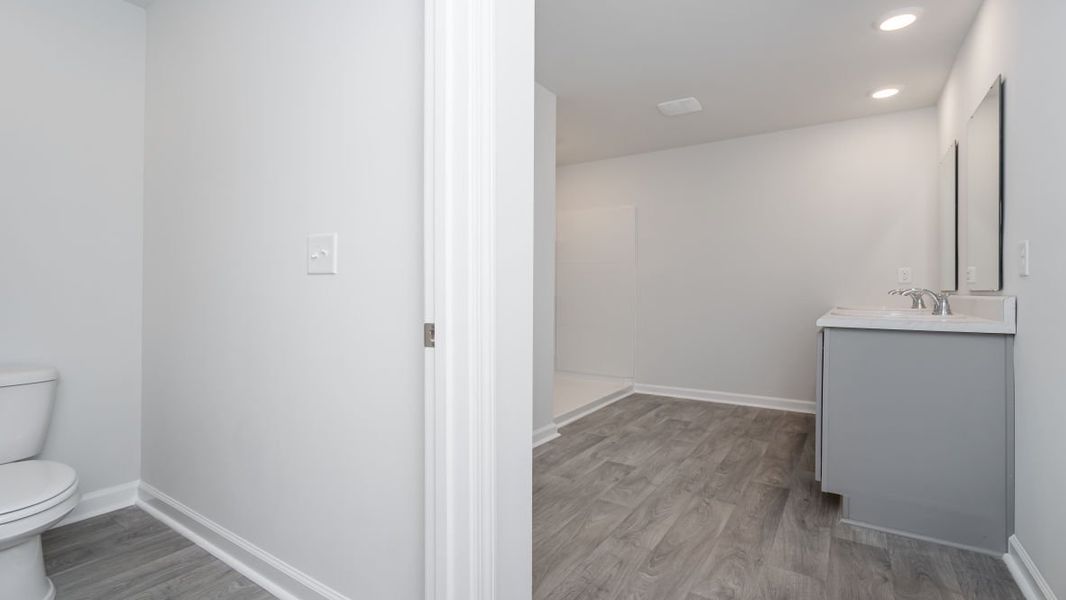 Representative unfurnished interior of a home built from the ARIA by D.R. Horton in Stanbury Creek, Supply (Image 27).