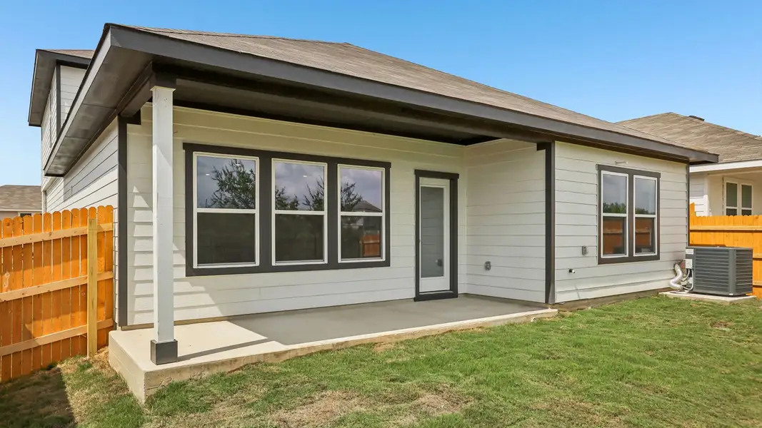 Exterior details and patio area of a home in Prairie Lakes, Buda (Image 21).