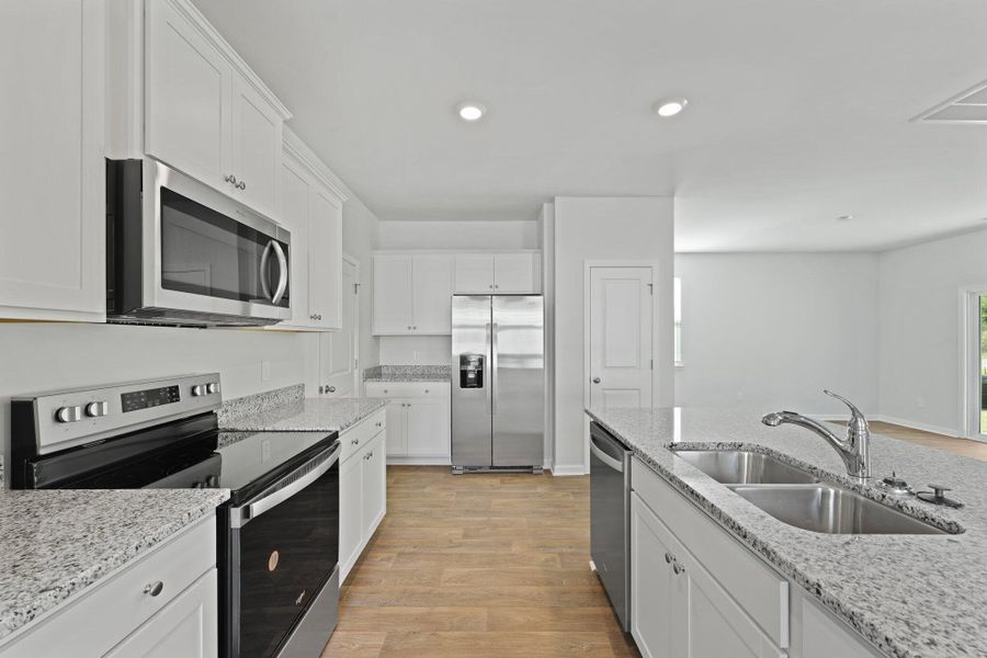 Furnished interior view inside a new home in Hillcrest, Ravenel (Image 8). Furnished interior view inside a new home in Hillcrest, Ravenel (Image 8).