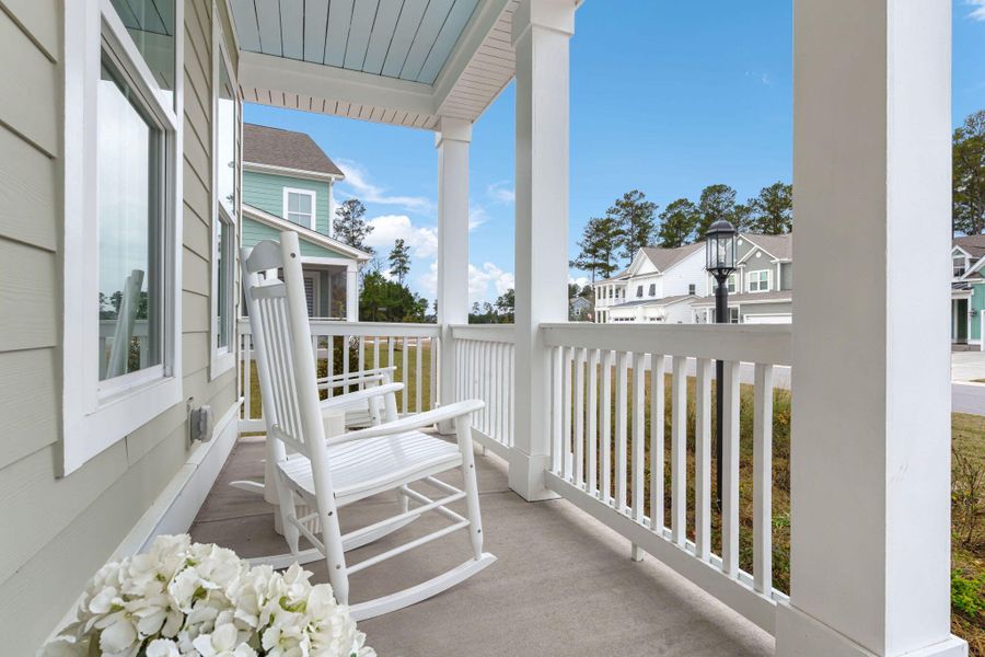 Exterior details and patio area of a home in Tidewater at Lakes of Cane Bay, Summerville (Image 3).