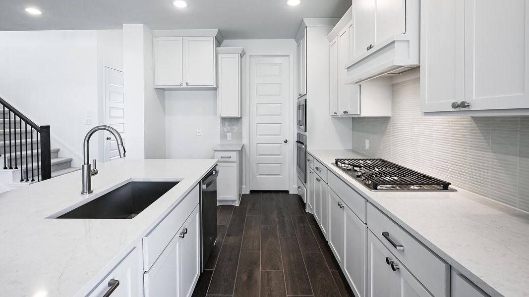 Furnished interior view inside a new home in 6 Creeks, Kyle (Image 6).