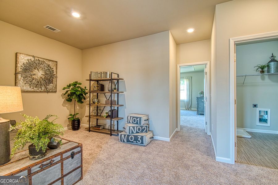 Furnished interior view inside a new home in Millstone at Mundy Mill, Gainesville (Image 12). Furnished interior view inside a new home in Millstone at Mundy Mill, Gainesville (Image 12).