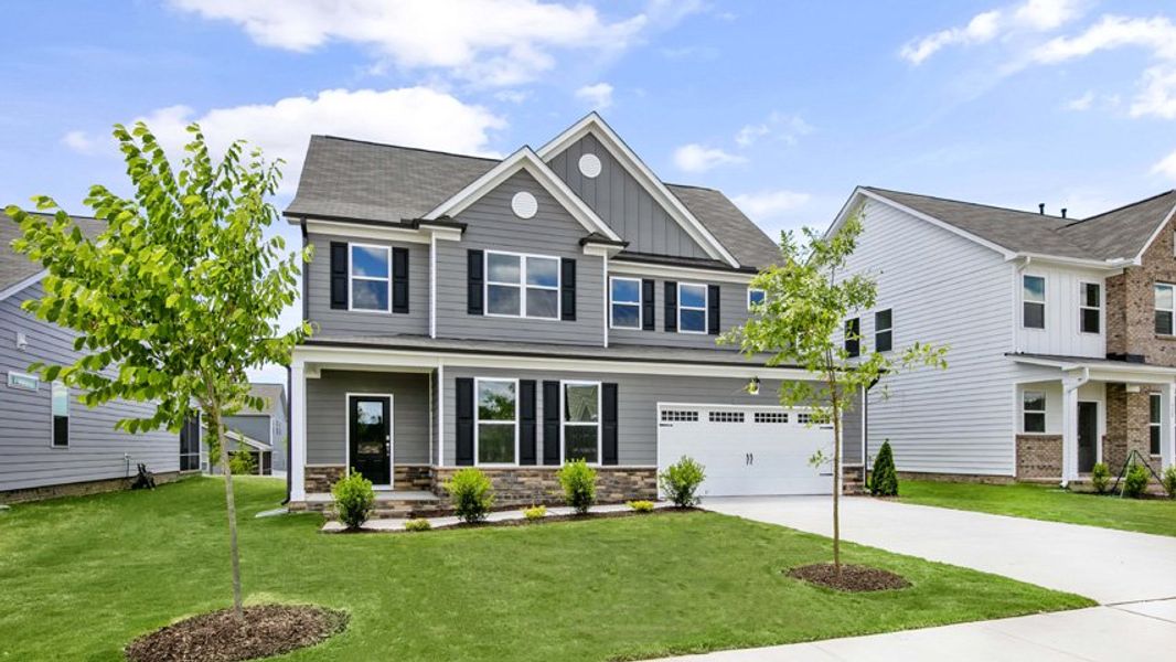 Representative exterior photo of a completed home built from the Lucas by D.R. Horton in The Manors at Haywood Glen, Knightdale, NC (Image 26).