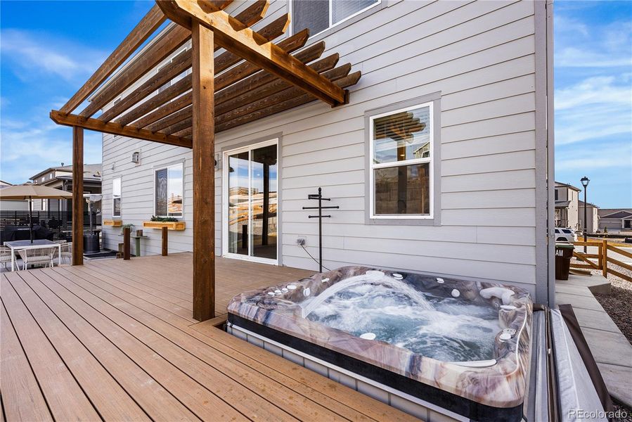 Exterior details and patio area of a home in Poudre Heights: The Alpine Collection, Windsor (Image 23).