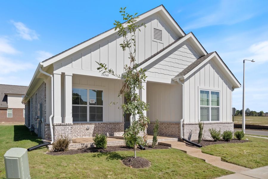 Front exterior of a new home in Lockwood, Collierville, TN, highlighting curb appeal (Image 2). Front exterior of a new home in Lockwood, Collierville, TN, highlighting curb appeal (Image 2).