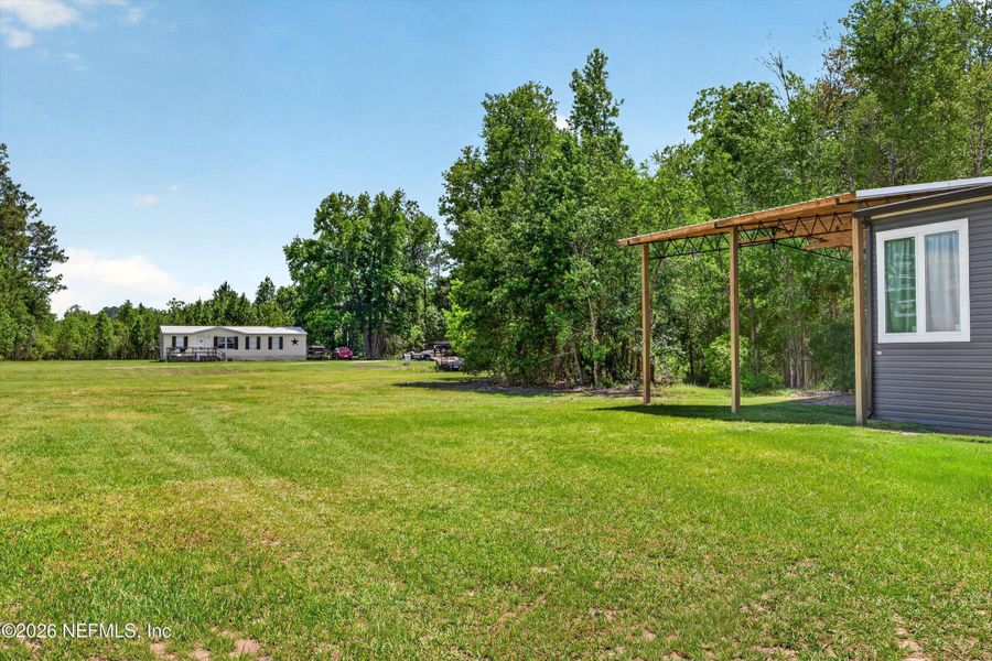 Exterior details and patio area of a home in , Starke (Image 22).
