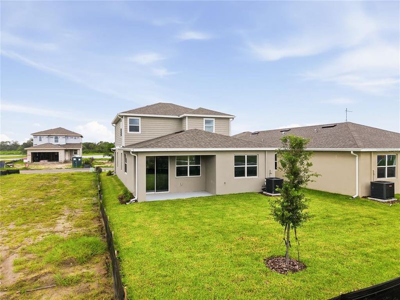 Exterior details and patio area of a home in Estates at Rivers Edge, Parrish (Image 2). Exterior details and patio area of a home in Estates at Rivers Edge, Parrish (Image 2).