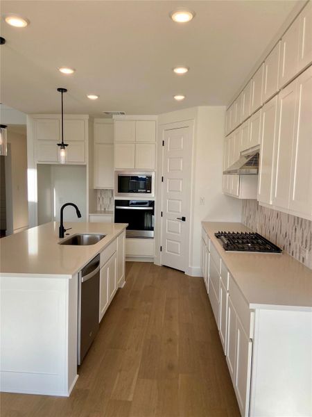 Furnished interior view inside a new home in Blackhawk in Pflugerville, Pflugerville (Image 5).