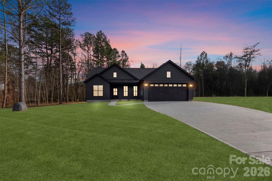 Front exterior of a new home in , China Grove, NC, highlighting curb appeal (Image 23).