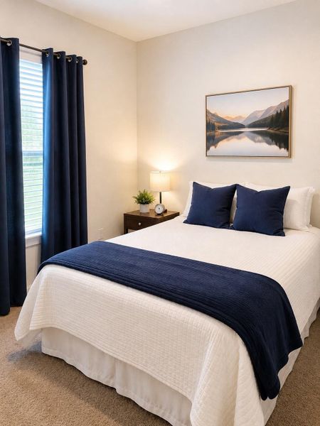 Located on the opposite side of the home from the primary suite, the secondary bedrooms offer privacy, comfort, and flexibility for family, guests, or work-from-home needs - digitally staged Located on the opposite side of the home from the primary suite, the secondary bedrooms offer privacy, comfort, and flexibility for family, guests, or work-from-home needs - digitally staged
