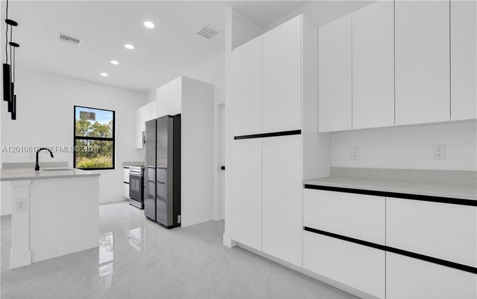 Furnished interior view inside a new home in , Lehigh Acres (Image 12).