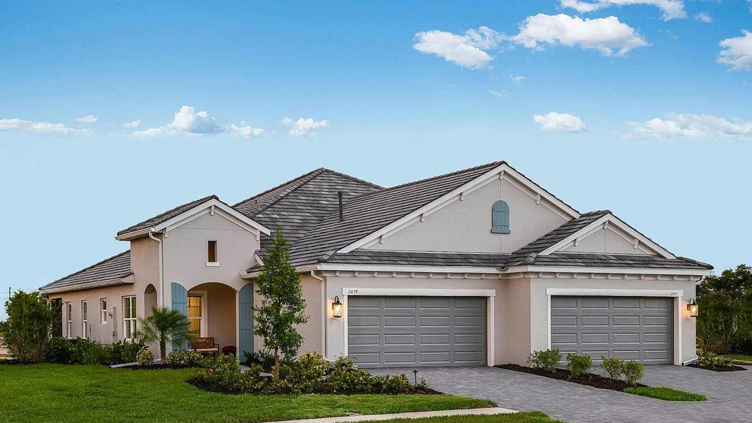 Front exterior of a new home in Windward Real Estate and Homes for Sale in Sarasota, FL - Neal Communities, Sarasota, FL, highlighting curb appeal (Image 2).