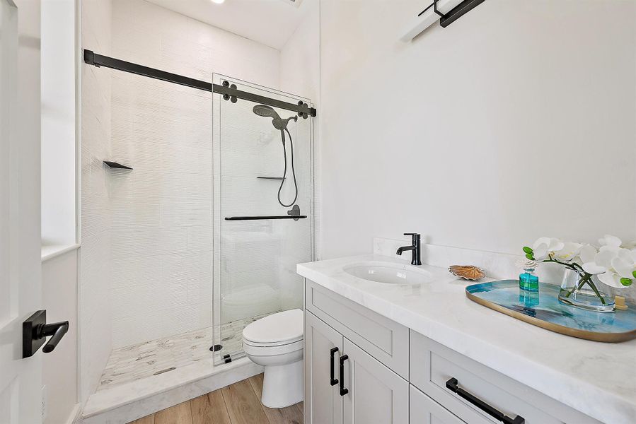 Furnished interior view inside a new home in , Tequesta (Image 10).