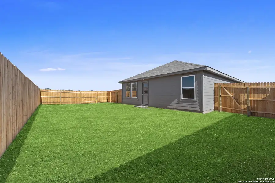 Exterior details and patio area of a home in Randolph Crossing: Cottage Collection, Converse (Image 2). Exterior details and patio area of a home in Randolph Crossing: Cottage Collection, Converse (Image 2).
