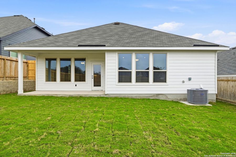 Exterior details and patio area of a home in Vista Ridge, Live Oak (Image 18).