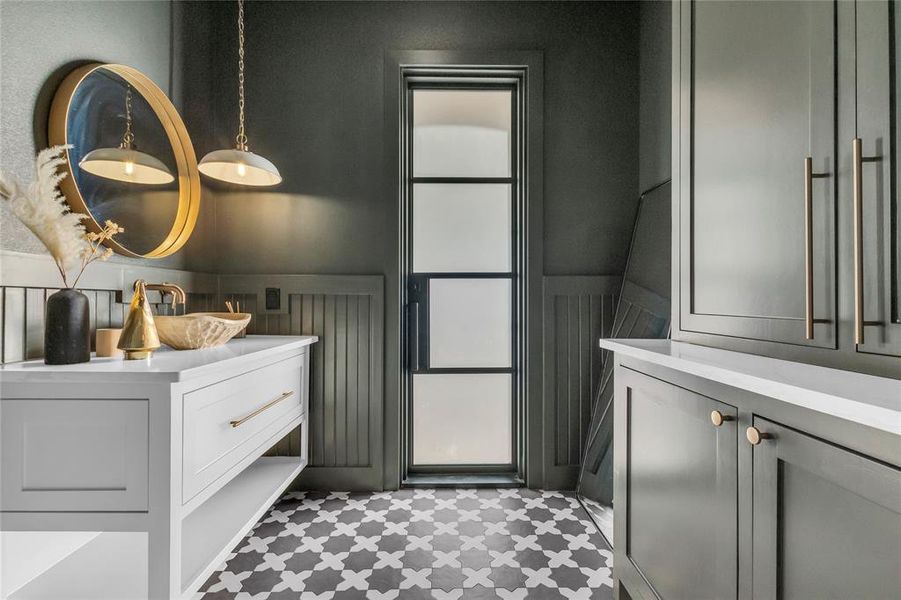 Powder bath with iron door to back patio