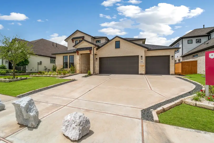 Front exterior of a new home in The Retreat at Norman Farm, Hendersonville, TN, highlighting curb appeal (Image 23).