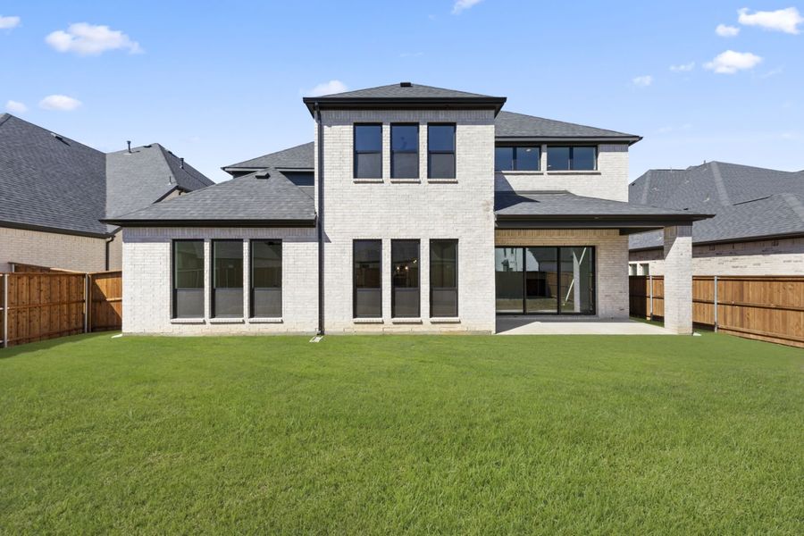Exterior details and patio area of a home in Estates at Rockhill, Frisco (Image 20).