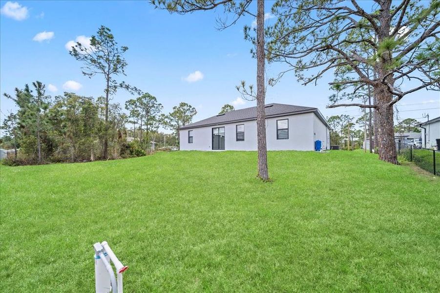 Exterior details and patio area of a home in , Lehigh Acres (Image 19).