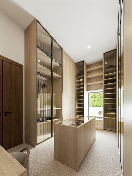 Custom-built closet system featuring light wood-finish cabinetry, fluted glass cabinet doors, open shelving, and a central island with a glass display top