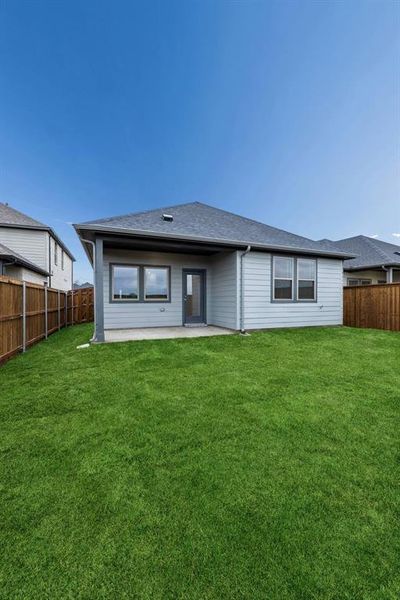Covered Patio in the Cedar home plan by Trophy Signature Homes – REPRESENTATIVE PHOTO