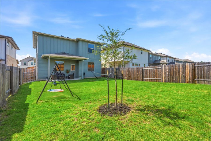 Exterior details and patio area of a home in Crosswinds, Kyle (Image 23).