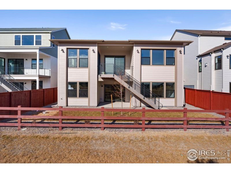 Front exterior of a new home in Festival at RainDance, Windsor, CO, highlighting curb appeal (Image 15).