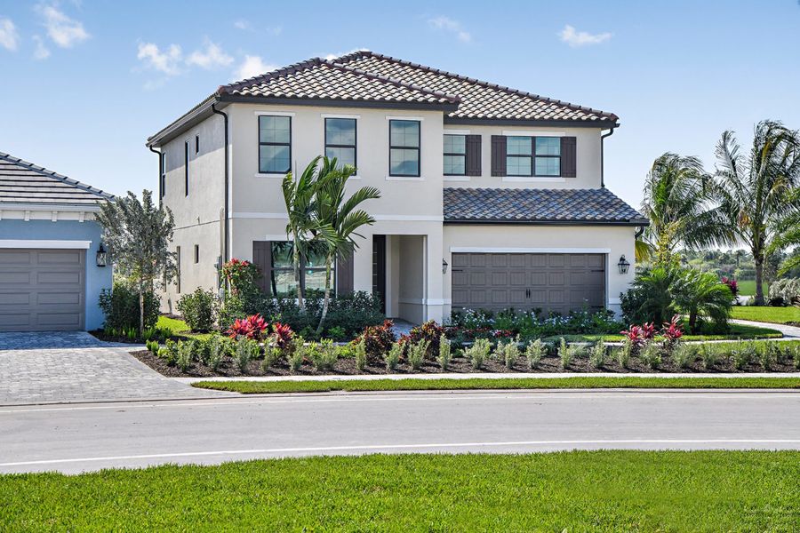 Representative exterior photo of a completed home built from the White Star by Neal Communities in SkySail, Naples, FL (Image 20).