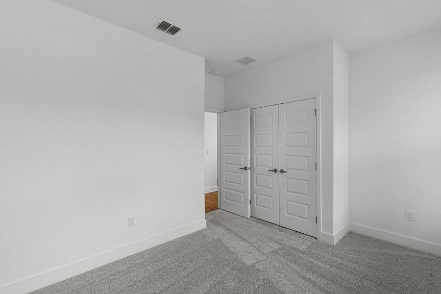 Representative unfurnished interior of a home built from the Franklin by Rockwell Homes in Harvest at Ovation - Townhomes, Winter Garden (Image 60). Representative unfurnished interior of a home built from the Franklin by Rockwell Homes in Harvest at Ovation - Townhomes, Winter Garden (Image 60).