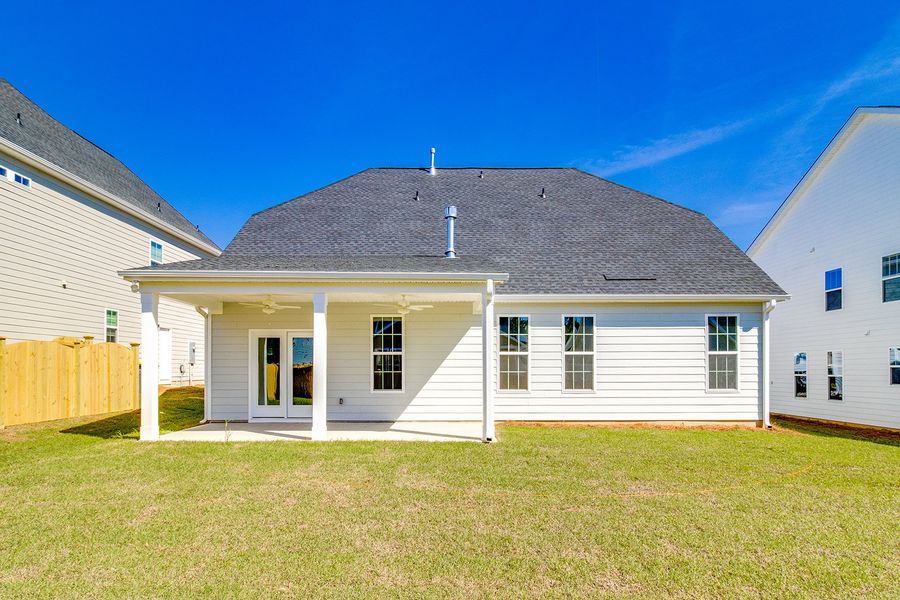 Exterior details and patio area of a home in Pebble Branch, Chapin (Image 23).