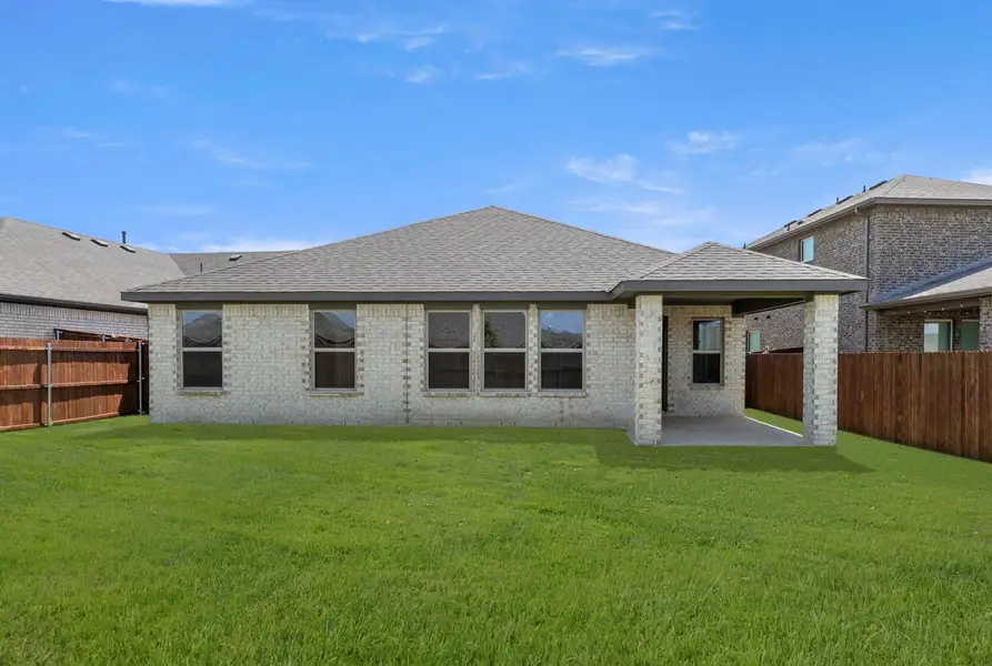 Front exterior of a new home in Northspur, Terrell, TX, highlighting curb appeal (Image 26).