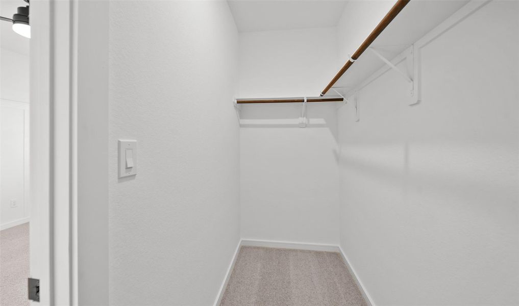 Primary walk-in closet (*Photo not of actual home and used for illustration purposes only.) Primary walk-in closet (*Photo not of actual home and used for illustration purposes only.)