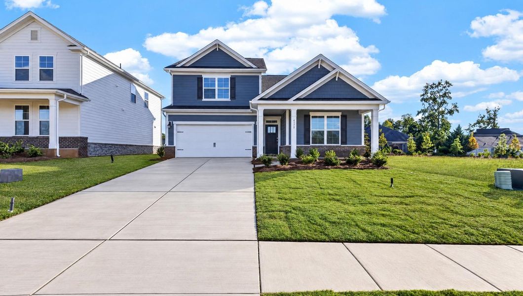 Front exterior of a new home in Avalon of Gastonia, Gastonia, NC, highlighting curb appeal (Image 1). Front exterior of a new home in Avalon of Gastonia, Gastonia, NC, highlighting curb appeal (Image 1).