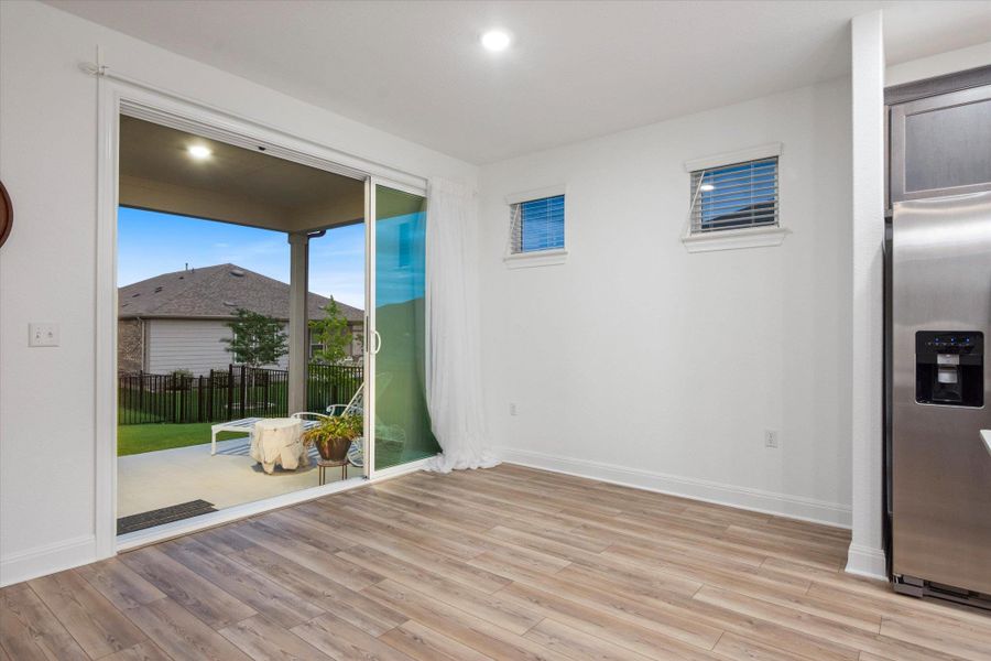 Double wide sliding doors open making the patio area perfect for entertaining